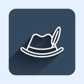 White line Oktoberfest hat icon isolated with long shadow background. Hunter hat with feather. German hat. Blue square