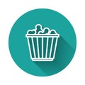 White line Popcorn in cardboard box icon isolated with long shadow. Popcorn bucket box. Green circle button. Vector