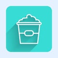 White line Popcorn in cardboard box icon isolated with long shadow. Popcorn bucket box. Green square button. Vector