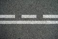 White lines and dashed lines on the asphalt road Royalty Free Stock Photo