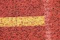 White lines and texture of running racetrack, red rubber racetracks in small stadium Royalty Free Stock Photo