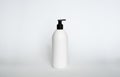 White liquid container for shampoo, gel, lotion, cream, bath foam etc. Blank unbranded cosmetic plastic bottle with Royalty Free Stock Photo