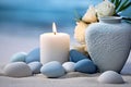 White lit aroma candle, heart and pebbles on beach. Generative AI