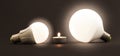 White little candle and LED electric bulbs on dark background. C