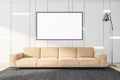 White living room with sofa and poster Royalty Free Stock Photo