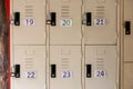 White lockers for safe storage There are numbers attached for memorization