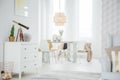 White loft interior with dresser