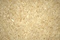 White long grain rice dense background. The picture is taken in close-up. Royalty Free Stock Photo