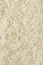 White long rice background, uncooked raw cereals texture, detailed vertical textured macro closeup