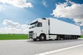 White lorry with trailer over blue sky Royalty Free Stock Photo