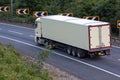 White lorry travelling on motorway Royalty Free Stock Photo