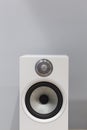 White loud speaker music on a grey background Royalty Free Stock Photo