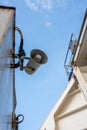 Loudspeaker on the ship, against the blue sky. Royalty Free Stock Photo