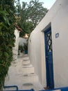 White low house with a blue door. Royalty Free Stock Photo