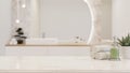 White luxury marble tabletop with copy space over blurred white elegance bathroom background