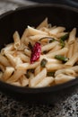 White macaroni with chilli and spices