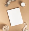 White magazine cover mockup and various decor