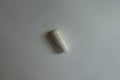 White magnesium citrate capsule from above