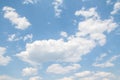 White magnificent cumulus clouds on a blue sky,
