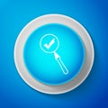 White Magnifying glass and check mark icon isolated on blue background. Magnifying glass and approved, confirm, done