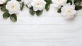 Minimalist White Magnolia Flowers On Rustic White Wood Table