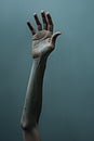 a white man hand and arm reaching up for help. dark teal background wall texture. reaching out to help. Helping hand. Royalty Free Stock Photo