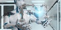 White man robot using robotics arms with digital screen 3D rendering Royalty Free Stock Photo