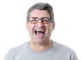 white man 40 to 50 years old smiling happy showing nice and positive face expression isolated on grey background Royalty Free Stock Photo