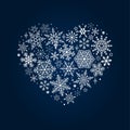 White many snowflakes in the shape of a herat on dark blue background. Vector lace banner Royalty Free Stock Photo