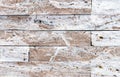 White marble with brown impregnations in the blocks for wall decoration indoors Royalty Free Stock Photo