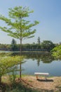 White marble chair locate near lake.