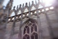 White marble construction on the roof of famous Cathedral Duomo di Milano, piazza in Milan, Italy. Blur and movement Royalty Free Stock Photo