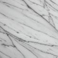 White marble with gray veining in diagonal lines. The surface is smooth with a natural Royalty Free Stock Photo