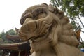 White marble guarding lionstatue at Emeishan (Mount Emei) Sichuan, China