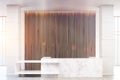 White marble reception, wood blinds, toned