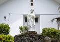 White marble sculpture of Saint Benedict at St. Benedicts Painted Church on the Big Island, Hawaii. Royalty Free Stock Photo