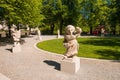 White marble sculptures of dwarfs in the Dwarf Garden Zwerglgarten, Salzburg, Austria