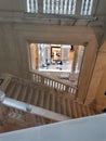 White marble stairs flanked by columns