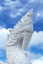 White marble statue of a buddhist Naga serpent in Thailand