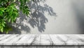 White marble stone tabletop and blurred bokeh office interior space background - can used for display or montage your products