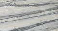White marble surface with dark gray veins running diagonally across. The marble has a Royalty Free Stock Photo