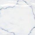 White marble surface with light gray veining patterns. Smooth texture and glossy finish Royalty Free Stock Photo