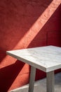 White marble table corner with light beam and shadow Royalty Free Stock Photo