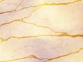 White marble or travertine with golden veins - abstract background Royalty Free Stock Photo