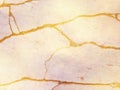 White marble or travertine with golden veins - abstract background Royalty Free Stock Photo