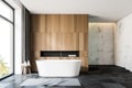 White marble and wooden bathroom interior with tub Royalty Free Stock Photo