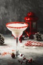 White margarita, Christmas or New Year`s winter alcoholic cocktail with rum, coconut and irish cream with red decor in stylish