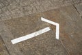 white marker made of tape as a signpost to an event