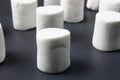 White marshmellow on dark background Royalty Free Stock Photo