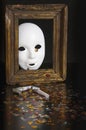White mask in an old frame Royalty Free Stock Photo